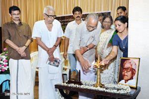 Mr. P.P.K. Poduval lighting the inaugural lamp.