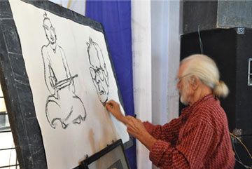 Artist Namboodiri drawing a sketch of Mahakavi Edasseri