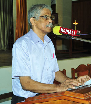 Dr. E. Divakaran speaking