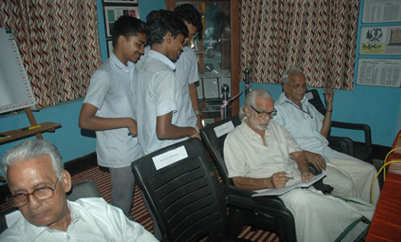 Students getting Artist Namboodiri's autograph