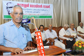 Dr. K.P. Mohanan introducing the book by Dr.M.R.Raghava Warriyar