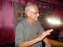 M. Gangadharan presenting paper on 'Edasseri's Poetry - Cultural Context.'