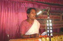 Radhakani Ayankalath welcoming guests in Session on 'Edasseri Poetry - Cultural Context.'